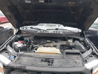 2021 Ford F-150 XL with VIN 1FTEW1EP6MFB59561, listed as a IAAI auction lot 41598532 with 68,662 mi miles and . Bid and sale history available at DreamBid. Image 10.