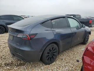 2022 Tesla Model Y Long Range z VIN 7SAYGAEE4NF543503, wystawiony jako Copart lot #47143155 z przebiegiem 53 874 mil mil oraz Szkody całkowita. Historia ofert i sprzedaży dostępna na DreamBid. Obrazek 3.