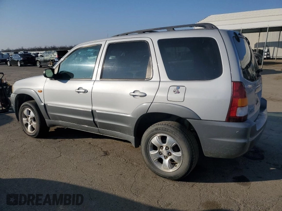 2002 Mazda Tribute LX with VIN 4F2YU09152KM50320, listed as a Copart auction lot 88131405 with 238,013 mi miles and Salvage Title. Bid and sale history available at carsss.com. Image 2.