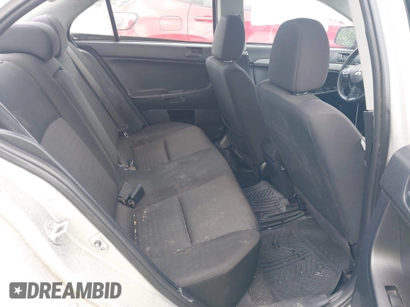 2013 Mitsubishi Lancer ES with VIN JA32U2FUXDU006887, listed as a IAAI auction lot 42619092 with 154,715 mi miles and . Bid and sale history available at DreamBid. Image 8.