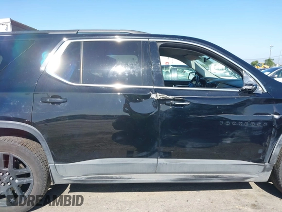 2019 Chevrolet Traverse LT Cloth z VIN 1GNEVGKW7KJ208656, wystawiony jako IAAI lot #42373422 z przebiegiem 132 863 mil mil oraz . Historia ofert i sprzedaży dostępna na DreamBid. Obrazek 14.