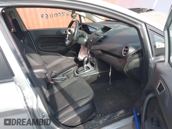 2014 Ford Fiesta SE with VIN 3FADP4EJ0EM215958, listed as a IAAI auction lot 42001168 with 115,231 mi miles and . Bid and sale history available at DreamBid. Image 5.