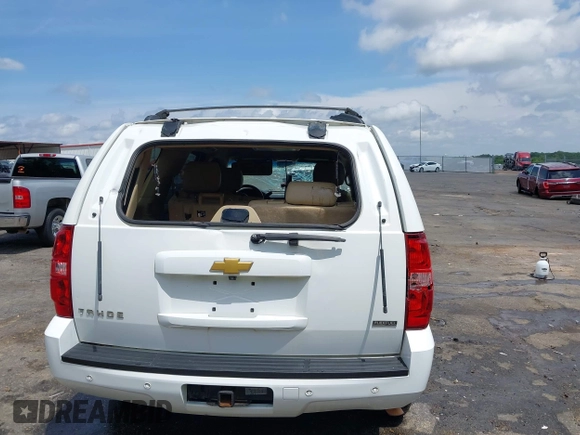 2012 Chevrolet Tahoe LT z VIN 1GNSCBE00CR176056, wystawiony jako IAAI lot #42091159 z przebiegiem 216 650 mil mil oraz . Historia ofert i sprzedaży dostępna na DreamBid. Obrazek 6.