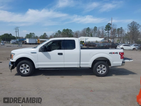 2018 Ford F-150 XL with VIN 1FTEX1EB4JFA77373, listed as a IAAI auction lot 41813197 with 235,251 mi miles and . Bid and sale history available at DreamBid. Image 15.
