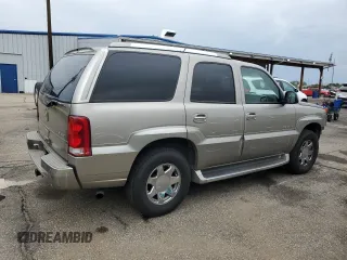 2003 Cadillac Escalade z VIN 1GYEK63N03R217374, wystawiony jako Copart lot #58380765 z przebiegiem 212 454 mil mil oraz Szkoda całkowita • Salvage title. Historia ofert i sprzedaży dostępna na DreamBid. Obrazek 3.