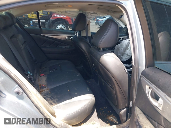 2015 Infiniti Q50 z VIN JN1BV7AP2FM357716, wystawiony jako IAAI lot #42504273 z przebiegiem 74 608 mil mil oraz . Historia ofert i sprzedaży dostępna na DreamBid. Obrazek 8.