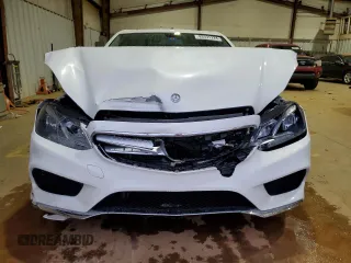 2014 Mercedes-Benz E 400 Sport with VIN WDDHF9FBXEA936424, listed as a Copart auction lot 83331224 with 194,689 mi miles and Salvage Title. Bid and sale history available at DreamBid. Image 5.