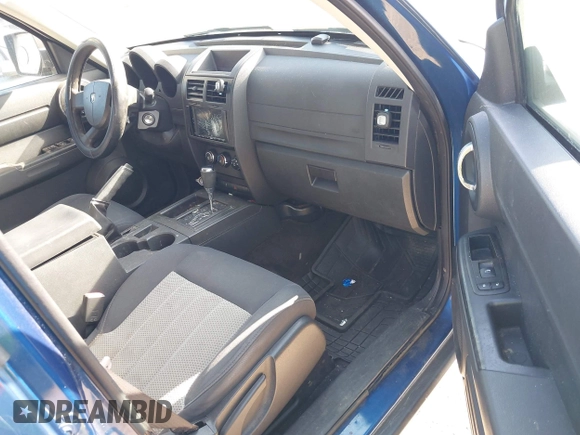 2010 Dodge Nitro SE with VIN 1D4PT2GK4AW141616, listed as a IAAI auction lot 42183953 with 128,023 mi miles. Bid and sale history available at carsss.com. Image 5.