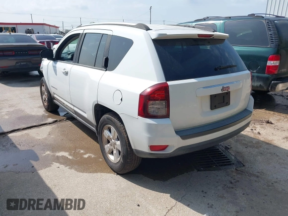 2014 Jeep Compass Altitude with VIN 1C4NJCBA0ED545173, listed as a IAAI auction lot 41924640 with 189,251 mi miles. Bid and sale history available at carsss.com. Image 3.