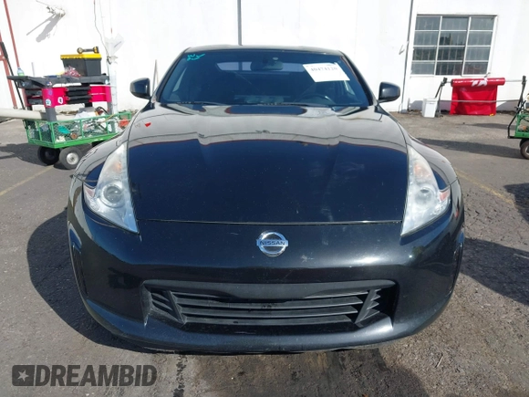 2013 Nissan 370Z z VIN JN1AZ4EH1DM880739, wystawiony jako IAAI lot #40474120 z przebiegiem 76 369 mil mil oraz . Historia ofert i sprzedaży dostępna na DreamBid. Obrazek 12.