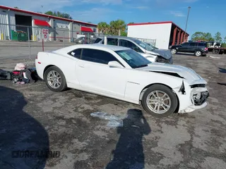 2014 Chevrolet Camaro LT z VIN 2G1FB1E32E9305387, wystawiony jako IAAI lot #42406536 z przebiegiem 129 121 mil mil oraz . Historia ofert i sprzedaży dostępna na DreamBid. Obrazek 1.