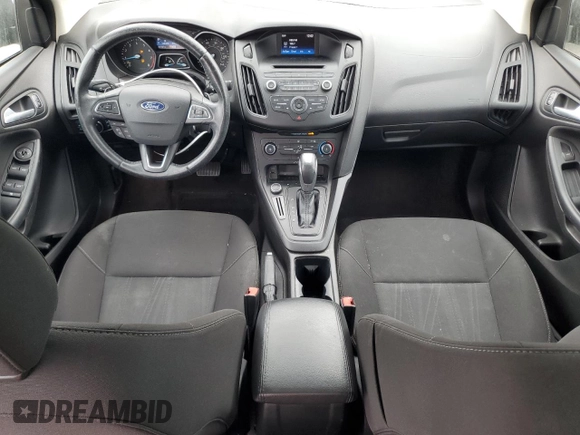 2016 Ford Focus SE z VIN 1FADP3F23GL405565, wystawiony jako Copart lot #60173935 z przebiegiem 82 167 mil mil oraz Szkoda całkowita • Salvage title. Historia ofert i sprzedaży dostępna na DreamBid. Obrazek 8.