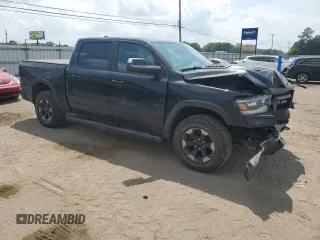 2019 Ram 1500 Rebel z VIN 1C6SRFLT8KN618140, wystawiony jako Copart lot #54734815 z przebiegiem 145 040 mil mil oraz Szkoda całkowita • Salvage title. Historia ofert i sprzedaży dostępna na DreamBid. Obrazek 4.