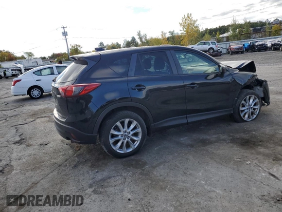 2015 Mazda CX-5 Grand Touring with VIN JM3KE4DY2F0480639, listed as a Copart auction lot 75248594 with 104,652 mi miles and Non Repairable. Bid and sale history available at carsss.com. Image 3.