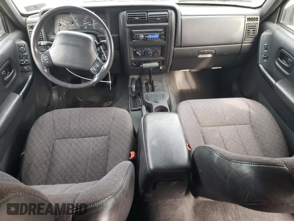 2001 Jeep Cherokee Sport with VIN 1J4FF58S71L576951, listed as a Copart auction lot 78390844 with 267,142 mi miles and Salvage title. Bid and sale history available at DreamBid. Image 8.