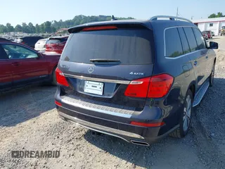 2014 Mercedes-Benz GL 450 с VIN 4JGDF7CE6EA325717, выставлен на аукционе IAAI как лот 42567112 с пробегом 131 186 миль миль и . История ставок и продаж доступна на DreamBid. Изображение 4.