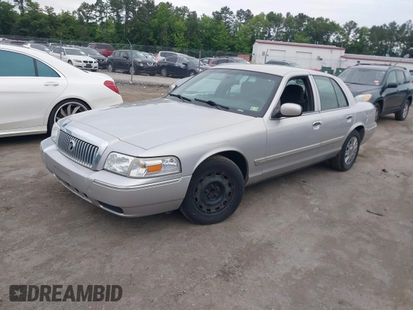 2006 Mercury Grand Marquis GS z VIN 2MEFM74V16X646802, wystawiony jako IAAI lot #42358697 z przebiegiem 169 321 mil mil oraz . Historia ofert i sprzedaży dostępna na DreamBid. Obrazek 2.