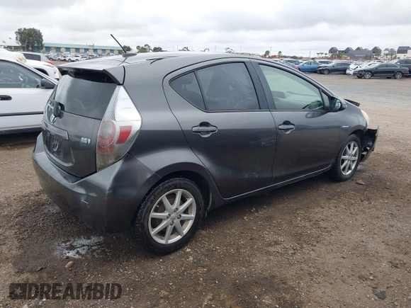 2012 Toyota Prius One z VIN JTDKDTB35C1015243, wystawiony jako IAAI lot #41692077 z przebiegiem 304 394 mil mil oraz . Historia ofert i sprzedaży dostępna na DreamBid. Obrazek 4.