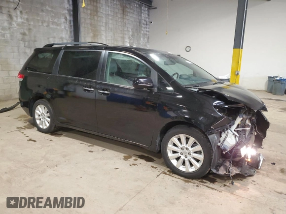 2011 Toyota Sienna XLE with VIN 5TDDK3DC1BS028679, listed as a Copart auction lot 52450655 with 114,054 mi miles and Salvage Title. Bid and sale history available at carsss.com. Image 4.