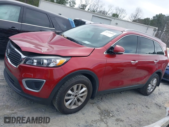 2018 Kia Sorento LX z VIN 5XYPG4A39JG400774, wystawiony jako IAAI lot #41711055 z przebiegiem 56 046 mil mil oraz . Historia ofert i sprzedaży dostępna na DreamBid. Obrazek 14.