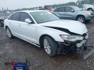 2014 Audi A6 Premium Plus z VIN WAUFGAFC4EN081900, wystawiony jako IAAI lot #42268150 z przebiegiem 150 238 mil mil oraz . Historia ofert i sprzedaży dostępna na DreamBid. Obrazek 1.