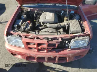 2001 Isuzu Rodeo S with VIN 4S2CK58W014302125, listed as a Copart auction lot 76425614 with 204,350 mi miles and Salvage title. Bid and sale history available at DreamBid. Image 12.