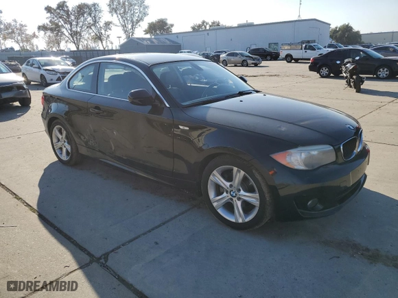 2013 BMW 1 Series 128i with VIN WBAUP9C5XDVS95834, listed as a Copart auction lot 83249614 with 0 mi miles and Salvage Title. Bid and sale history available at carsss.com. Image 4.
