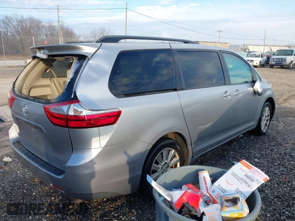 2017 Toyota Sienna LE with VIN 5TDJZ3DC6HS184126, listed as a IAAI auction lot 41166135 with 101,305 mi miles. Bid and sale history available at carsss.com. Image 4.