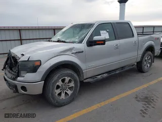 2013 Ford F-150 XL with VIN 1FTFW1ET8DFB81319, listed as a IAAI auction lot 41103635 with 218,615 mi miles. Bid and sale history available at carsss.com. Image 17.