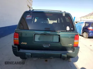 1998 Jeep Grand Cherokee Limited with VIN 1J4GZ78Y1WC124156, listed as a Copart auction lot 77587394 with 176,936 mi miles and Clean Title. Bid and sale history available at carsss.com. Image 6.
