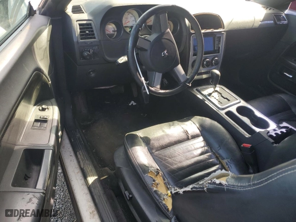 2009 Dodge Challenger SE with VIN 2B3LJ44V59H599575, listed as a Copart auction lot 87548195 with 229,216 mi miles and Salvage Title. Bid and sale history available at carsss.com. Image 8.