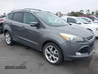 2013 Ford Escape Titanium with VIN 1FMCU0J9XDUD86354, listed as a IAAI auction lot 42420780 with 260,995 mi miles and . Bid and sale history available at DreamBid. Image 1.