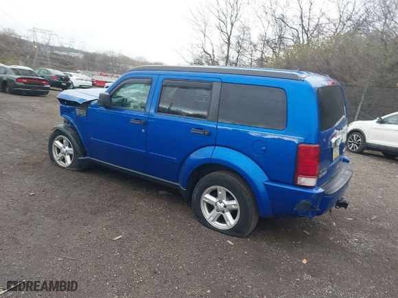 2007 Dodge Nitro SLT with VIN 1D8GU58K97W560212, listed as a IAAI auction lot 41018041 with 1 mi miles. Bid and sale history available at carsss.com. Image 3.