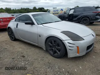 2004 Nissan 350Z Touring z VIN JN1AZ34E24T060564, wystawiony jako Copart lot #69689414 z przebiegiem Nie podano mil oraz Nie do naprawy • Non repairable. Historia ofert i sprzedaży dostępna na DreamBid. Obrazek 4.