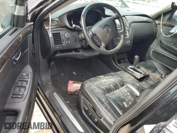 2010 Cadillac DTS 1SA z VIN 1G6KA5EY1AU116600, wystawiony jako Copart lot #71453974 z przebiegiem 111 626 mil mil oraz Szkoda całkowita • Salvage title. Historia ofert i sprzedaży dostępna na DreamBid. Obrazek 8.