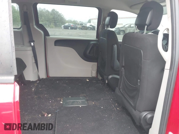2015 Dodge Grand Caravan SE with VIN 2C4RDGBG0FR607075, listed as a IAAI auction lot 41968102 with 168,553 mi miles and . Bid and sale history available at DreamBid. Image 8.