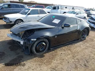 2009 Nissan 370Z Touring with VIN JN1AZ44E39M408668, listed as a IAAI auction lot 41231840 with 93,826 mi miles and . Bid and sale history available at DreamBid. Image 18.