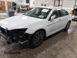 2013 Chrysler 200 Touring with VIN 1C3CCBBB2DN592416, listed as a IAAI auction lot 41732350 with 121,579 mi miles and . Bid and sale history available at carsss.com. Image 2.