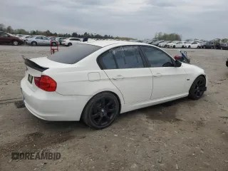 2009 BMW 3 Series 328i with VIN WBAPH77599NM31774, listed as a Copart auction lot 52669315 with 241,355 mi miles and Salvage title. Bid and sale history available at DreamBid. Image 3.