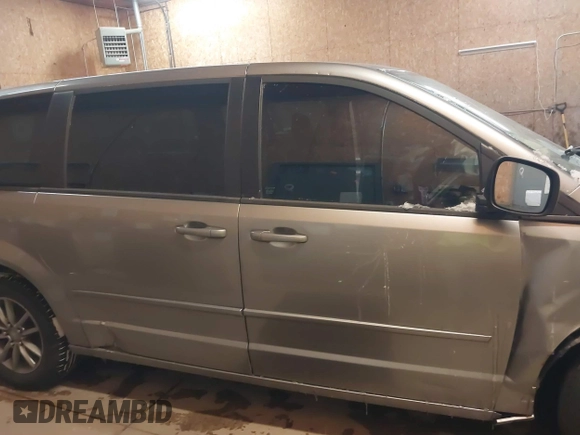 2015 Dodge Grand Caravan SE with VIN 2C4RDGBG1FR738659, listed as a IAAI auction lot 41547350 with 96,621 mi miles and . Bid and sale history available at DreamBid. Image 13.