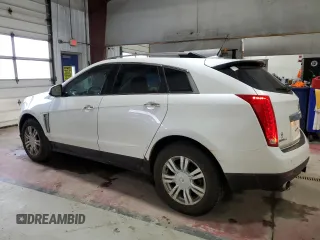 2013 Cadillac SRX Performance Collection with VIN 3GYFNHE36DS520905, listed as a Copart auction lot 47961515 with 128,523 mi miles and Salvage Title. Bid and sale history available at carsss.com. Image 2.