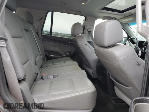 2016 Chevrolet Tahoe LT z VIN 1GNSKBKC9GR223107, wystawiony jako Copart lot #50146495 z przebiegiem 163 948 mil mil oraz Szkoda całkowita • Salvage title. Historia ofert i sprzedaży dostępna na DreamBid. Obrazek 11.