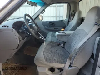 1999 Ford F-150 XL with VIN 1FTRF17L7XNA73732, listed as a Copart auction lot 74388514 with Not provided miles and Clean title. Bid and sale history available at DreamBid. Image 7.