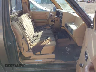 1988 Dodge Dakota with VIN 1B7GR14X0JS761859, listed as a IAAI auction lot 42012991 with 195,614 mi miles and . Bid and sale history available at DreamBid. Image 5.