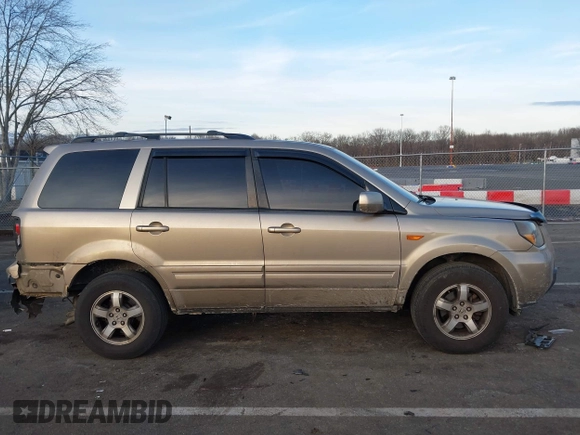 2007 Honda Pilot EX-L with VIN 2HKYF18667H509331, listed as a IAAI auction lot 41453510 with 228,746 mi miles and . Bid and sale history available at DreamBid. Image 13.