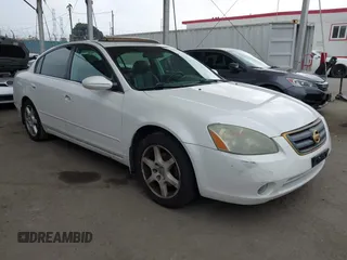 2004 Nissan Altima SE with VIN 1N4BL11D14C182745, listed as a IAAI auction lot 42348442 with 114,123 mi miles and . Bid and sale history available at DreamBid. Image 1.