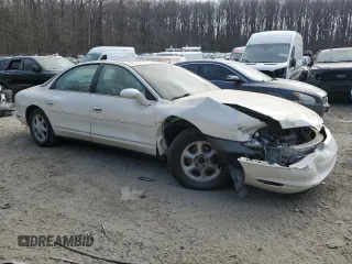 1999 Oldsmobile Aurora with VIN 1G3GR62C4X4112642, listed as a Copart auction lot 48176035 with 100,342 mi miles and Salvage Title. Bid and sale history available at DreamBid. Image 4.