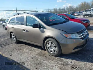 2012 Honda Odyssey LX with VIN 5FNRL5H29CB091860, listed as a IAAI auction lot 42000688 with 295,551 mi miles and . Bid and sale history available at carsss.com. Image 1.