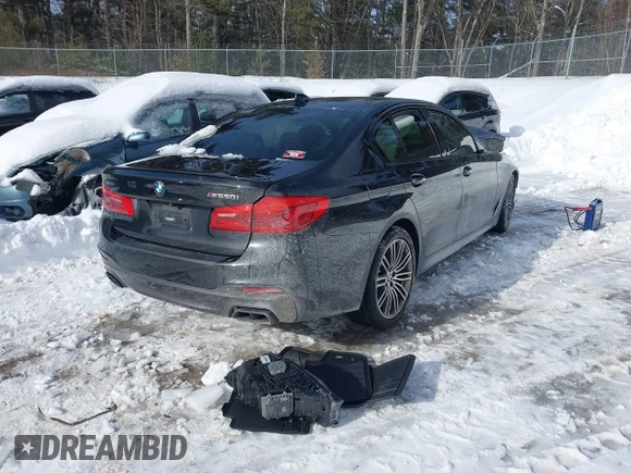 2020 BMW 5 Series M550i xDrive with VIN WBAJS7C00LCD91804, listed as a IAAI auction lot 41590368 with Not provided miles and . Bid and sale history available at DreamBid. Image 4.