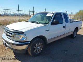 1998 Ford F-150 Standard with VIN 1FTZX1726WKB46576, listed as a IAAI auction lot 41881427 with 168,864 mi miles. Bid and sale history available at carsss.com. Image 2.